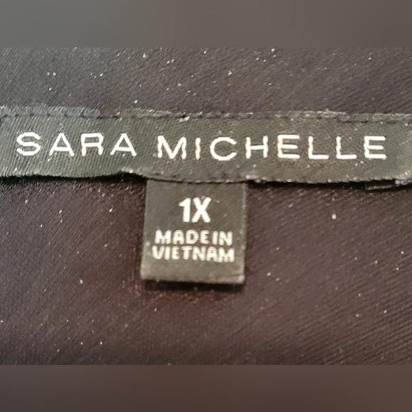 Fancy semi-sheer cascading flowy top over black tank. 1X - Picture 6 of 10